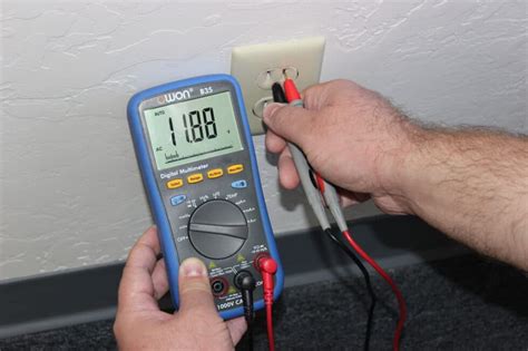 check electric box with volt meter|check outlet voltage with multimeter.